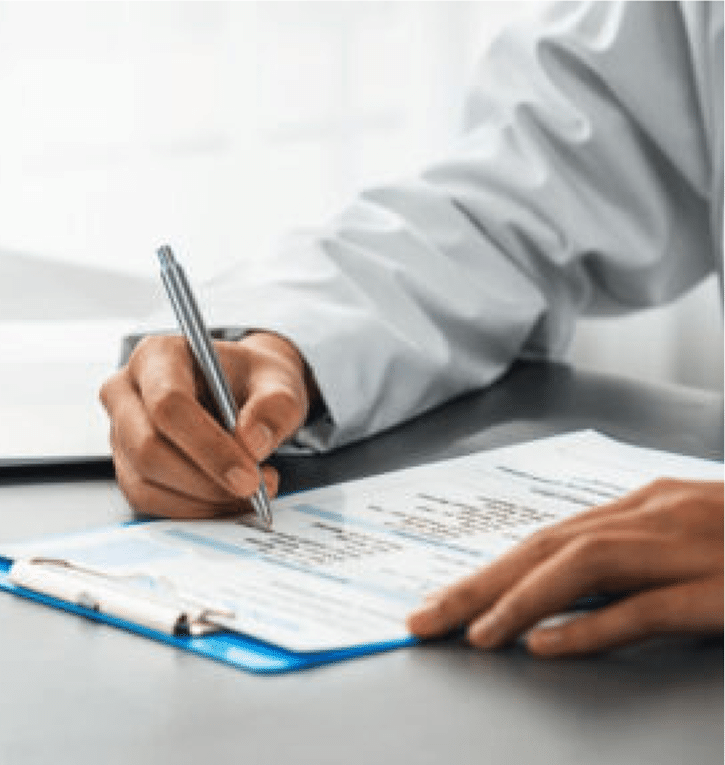 Doctor completing a testosterone testing request form during a men's health consultation.