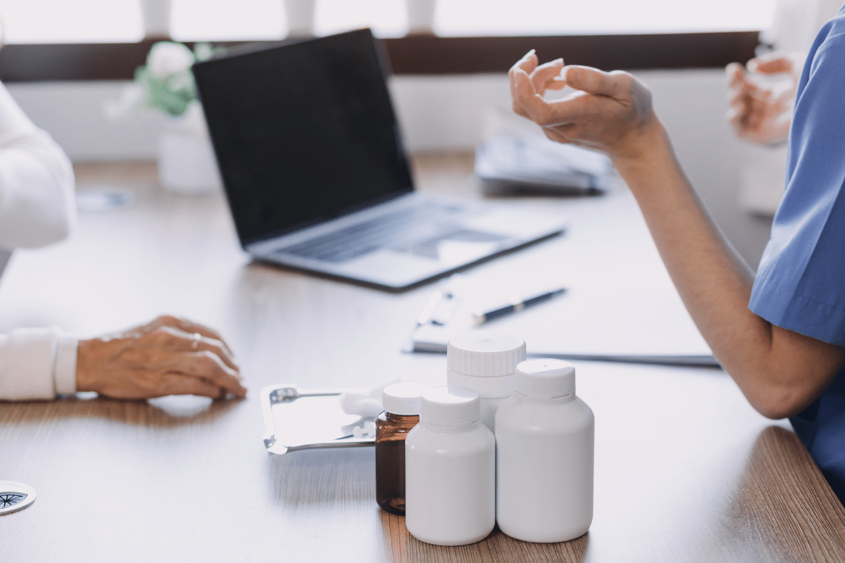 Doctor discussing weight loss medication options with an international patient at a Bangkok clinic