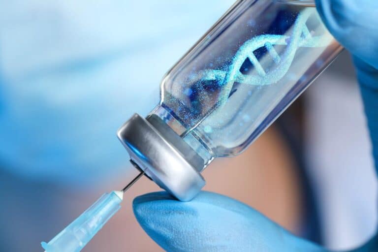 A vial containing a solution with stem cells during stem cell therapy research