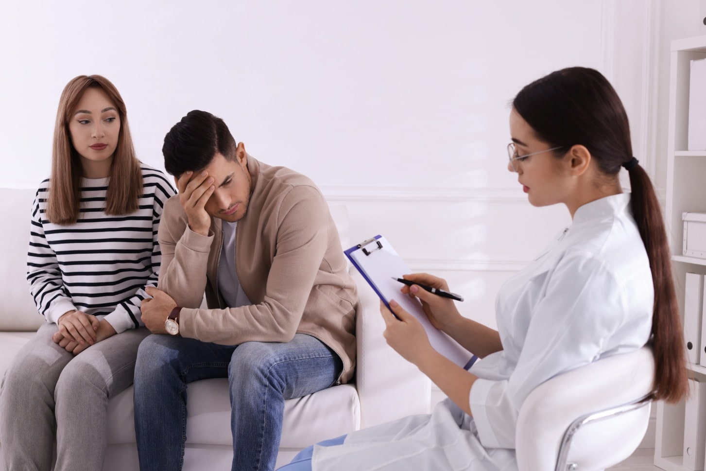 Couple attending a consultation to discuss trichomoniasis treatment